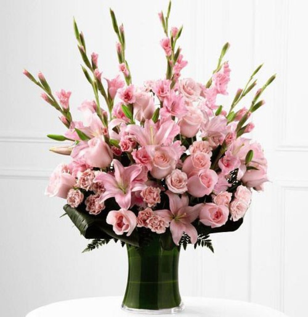 Vase with 5 Pink Lilies , 10 Pink Gladioli , 10 Pink Roses & 10 Pink Carnations